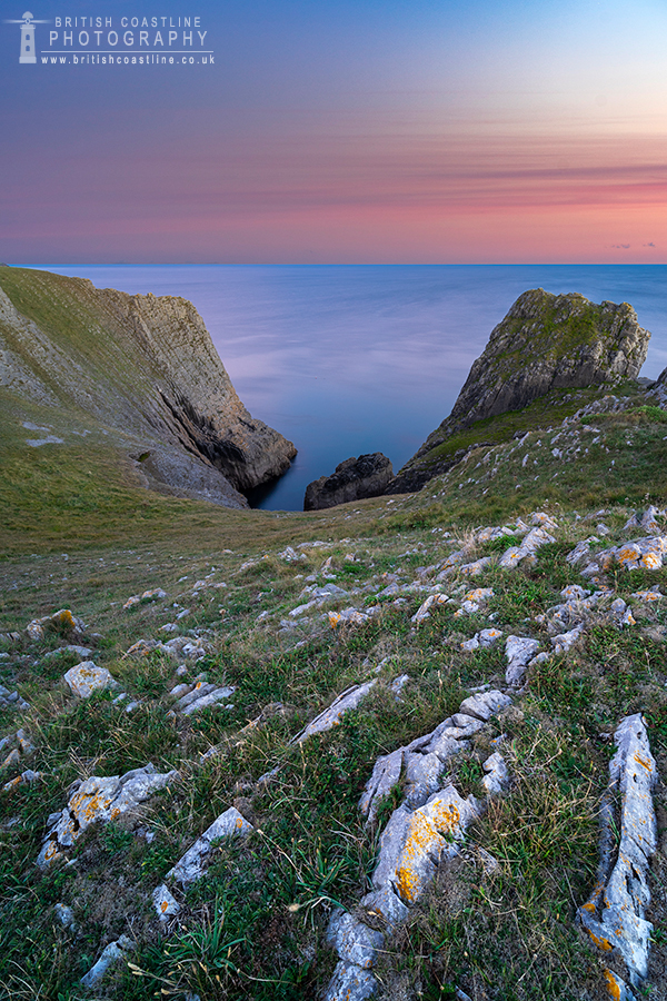 lydstep point pembrokeshire coast sea cliffs pink skies